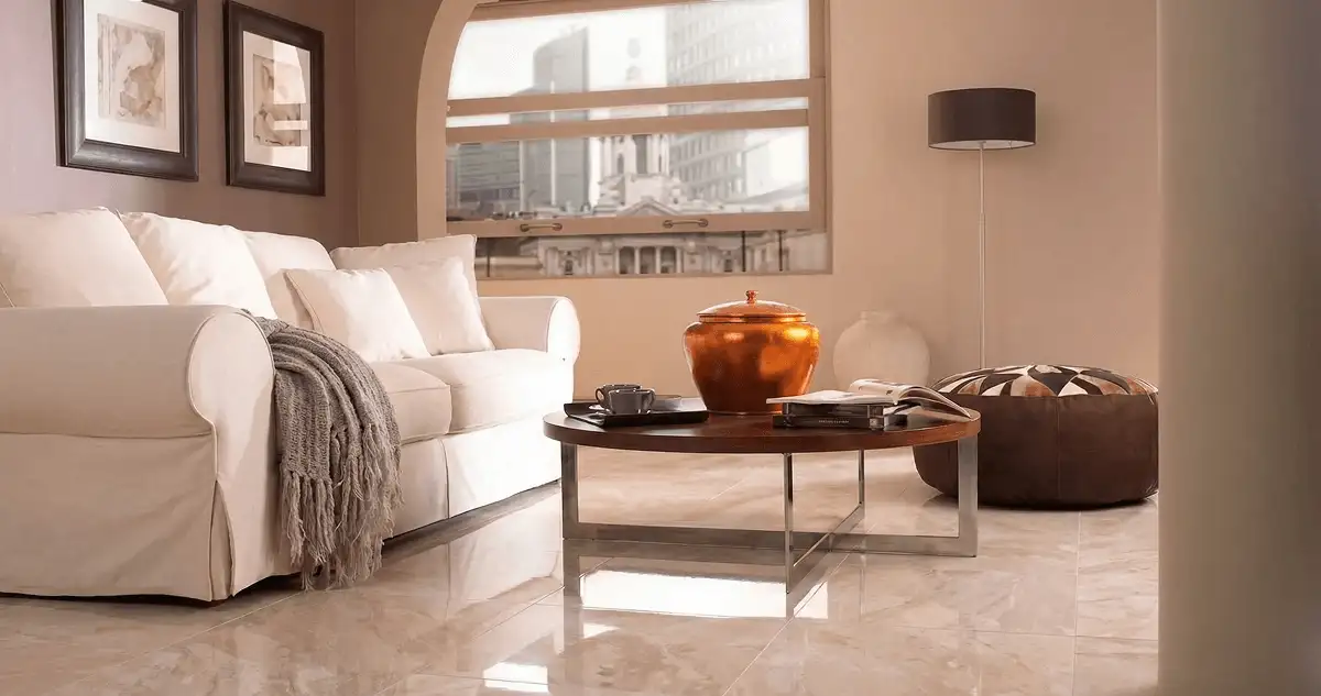 Modern living room with professionally installed marble flooring, a beige sofa, coffee table in Columbia, SC