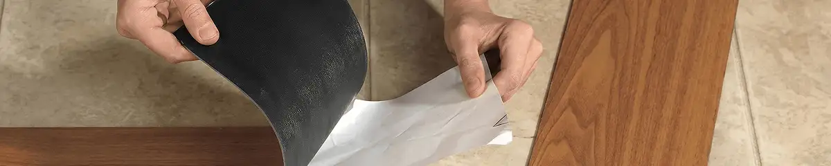 A professional installing vinyl flooring in Columbia, SC