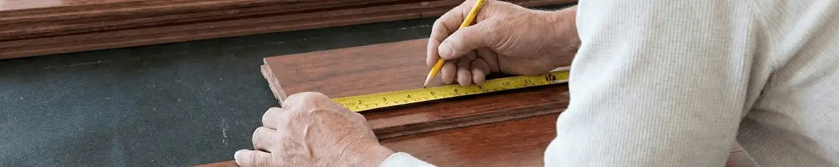 A professional installing wood flooring in Columbia, SC