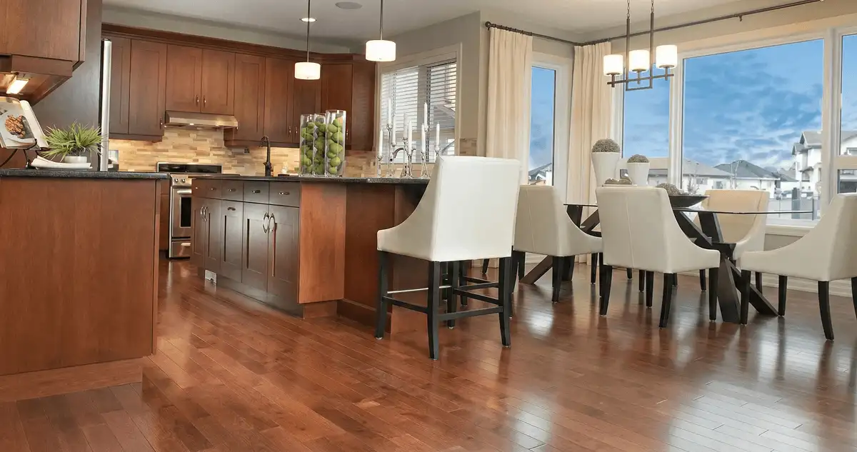 A modern kitchen with professionally installed wood flooring in Columbia, SC